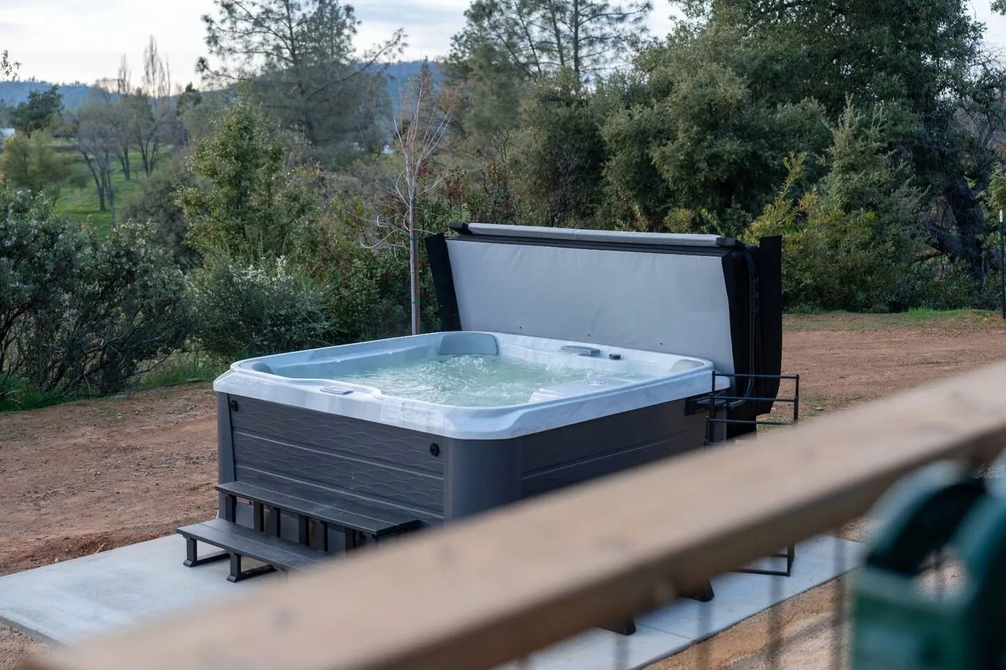 Six-person hot tub overlooking the Sierra foothills near Yosemite
